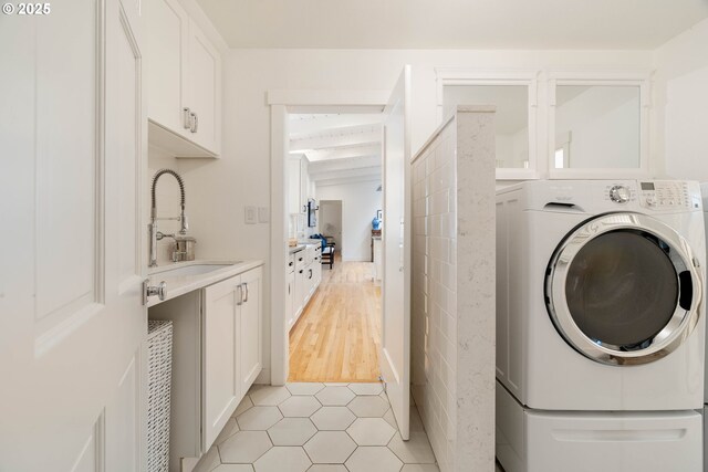 475 Iron Mountain Blvd, Lake Oswego, OR 97034 - laundry area with washer / clothes dryer, a sink, and light tile patterned flooring