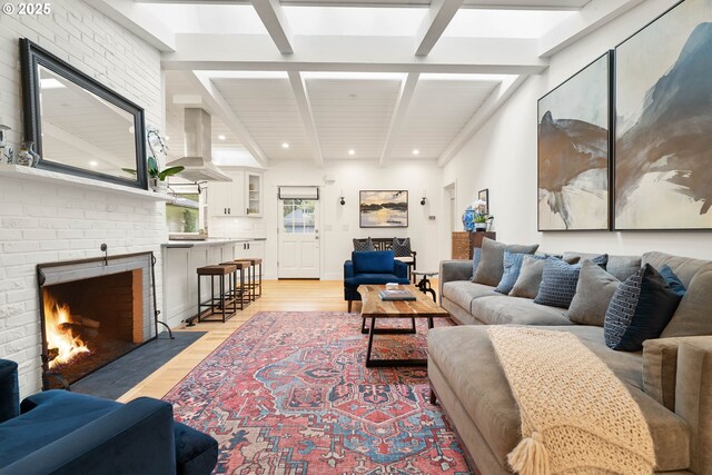 475 Iron Mountain Blvd, Lake Oswego, OR 97034 - living area with beam ceiling, light wood-style floors, recessed lighting, and a fireplace