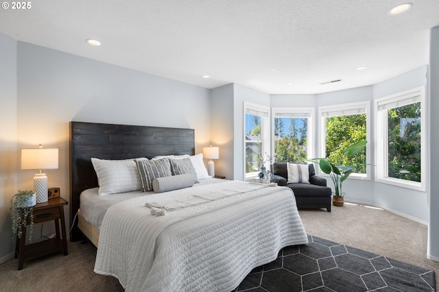 5346 NW Wickiup Way, Portland, OR 97229 - bedroom with dark colored carpet and recessed lighting