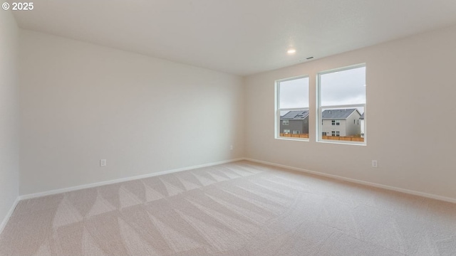 view of carpeted spare room