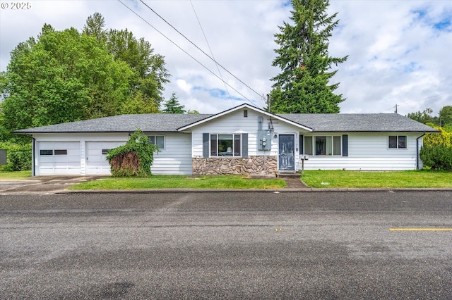 405 Redpath St, Kelso, WA 98626 - ranch-style home featuring an attached garage, concrete driveway, stone siding, a shingled roof, and a front lawn
