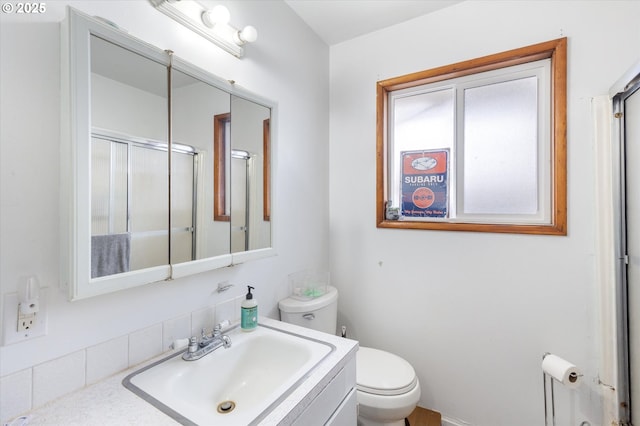 405 Redpath St, Kelso, WA 98626 - full bath featuring toilet, vanity, and a shower with shower door