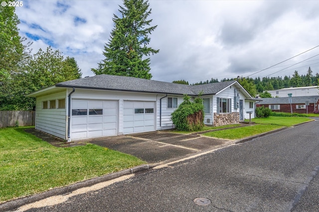 405 Redpath St, Kelso, WA 98626 - ranch-style house with an attached garage, a shingled roof, and driveway