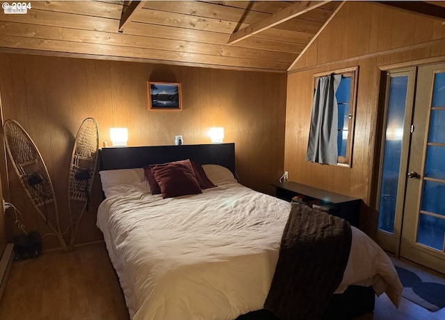 bedroom featuring vaulted ceiling, wooden walls, wood-type flooring, wooden ceiling, and french doors