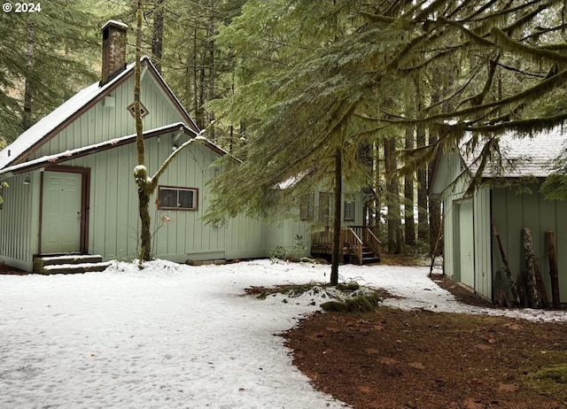 view of snow covered property