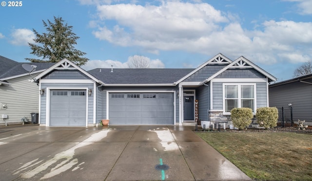 craftsman-style home with a garage and a front yard