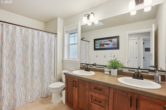 29176 SW Costa Cir E, Wilsonville, OR 97070 - bathroom featuring tile patterned flooring, toilet, and double vanity