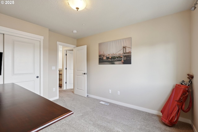 29176 SW Costa Cir E, Wilsonville, OR 97070 - unfurnished bedroom with carpet floors, baseboards, and a textured ceiling