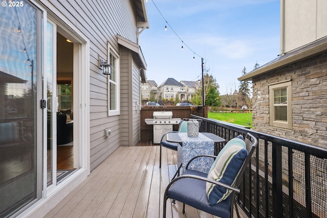 29176 SW Costa Cir E, Wilsonville, OR 97070 - wooden terrace featuring a grill and a residential view