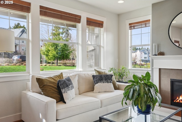 29176 SW Costa Cir E, Wilsonville, OR 97070 - living room featuring a tiled fireplace and recessed lighting