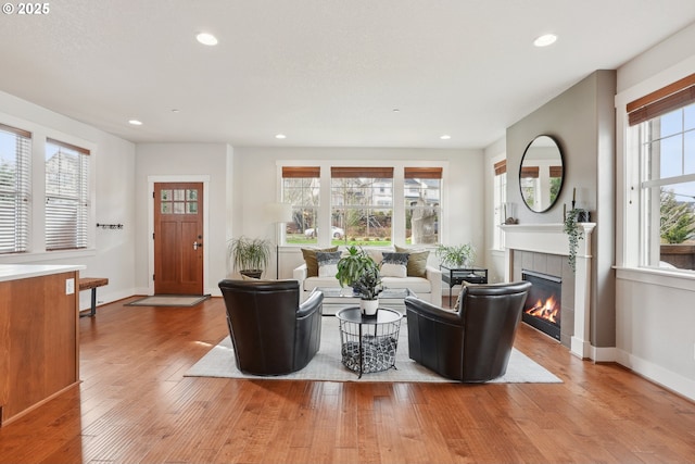 29176 SW Costa Cir E, Wilsonville, OR 97070 - living room with a fireplace, hardwood / wood-style floors, recessed lighting, and baseboards