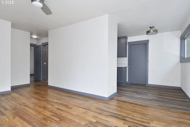 9936 SE Steele St, Portland, OR 97266 - unfurnished room with a ceiling fan and wood finished floors