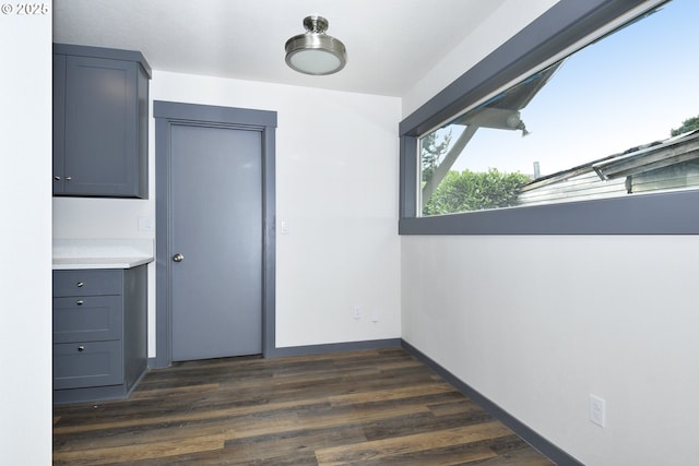 9936 SE Steele St, Portland, OR 97266 - empty room with dark wood finished floors and baseboards