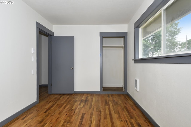 9936 SE Steele St, Portland, OR 97266 - unfurnished bedroom with wood finished floors and a closet