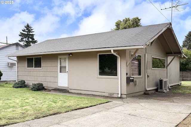 9936 SE Steele St, Portland, OR 97266 - view of front facade featuring entry steps, a shingled roof, and a wall mounted air conditioner