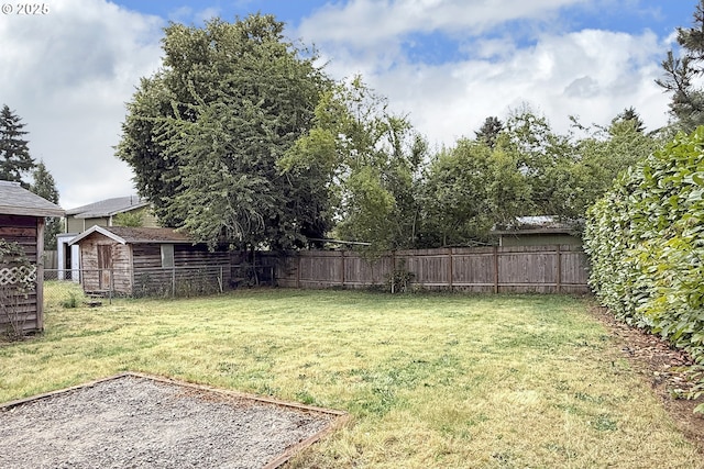 9936 SE Steele St, Portland, OR 97266 - fenced backyard featuring a storage unit