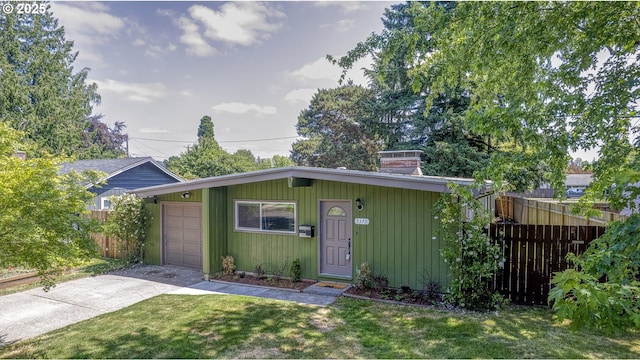5370 SW Washington Ave, Beaverton, OR 97005 - mid-century inspired home with driveway, a chimney, and a garage