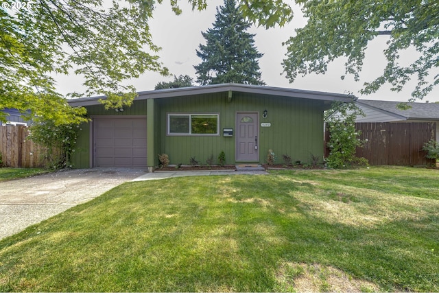 5370 SW Washington Ave, Beaverton, OR 97005 - mid-century home with an attached garage and concrete driveway