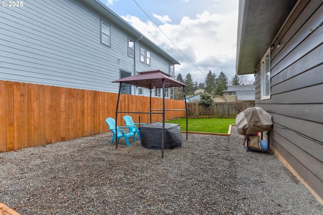 view of playground with a fenced backyard and central AC unit