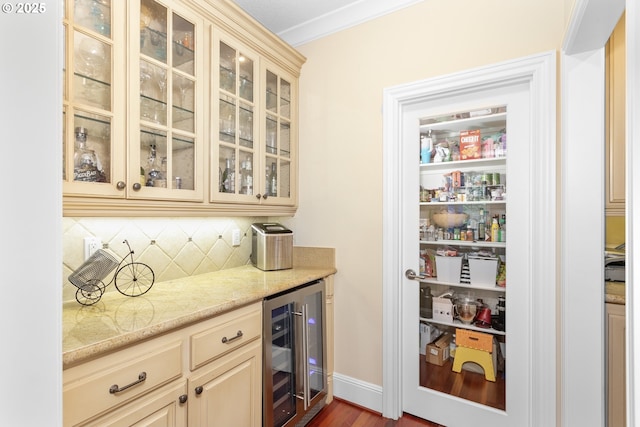 17677 Westview Dr, Lake Oswego, OR 97034 - indoor dry bar featuring beverage cooler, tasteful backsplash, dark wood finished floors, and crown molding