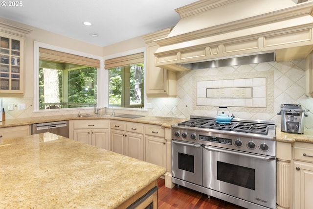 17677 Westview Dr, Lake Oswego, OR 97034 - kitchen featuring appliances with stainless steel finishes, cream cabinets, decorative backsplash, glass insert cabinets, and plenty of natural light