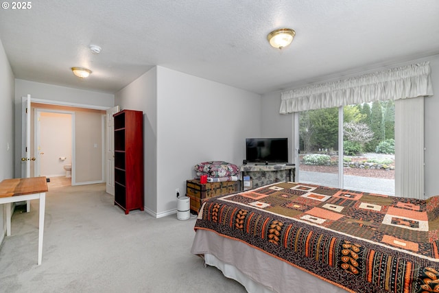 24788 E Mckenzie Valley Ct, Welches, OR 97067 - bedroom featuring light colored carpet, baseboards, and a textured ceiling