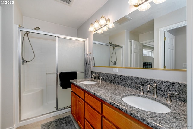 24788 E Mckenzie Valley Ct, Welches, OR 97067 - full bathroom with a shower stall, double vanity, and a sink