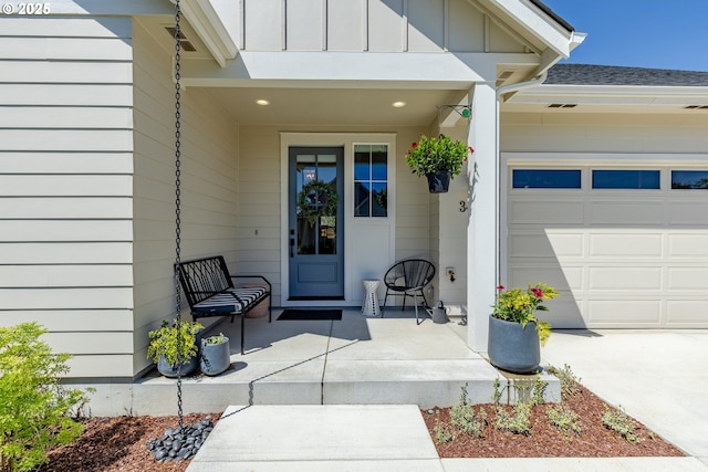 entrance to property featuring a garage