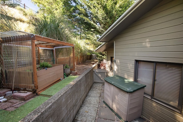 view of side of property featuring an outbuilding