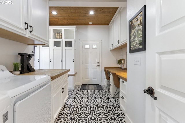 laundry room featuring wood ceiling, tile patterned flooring, cabinet space, separate washer and dryer, and recessed lighting