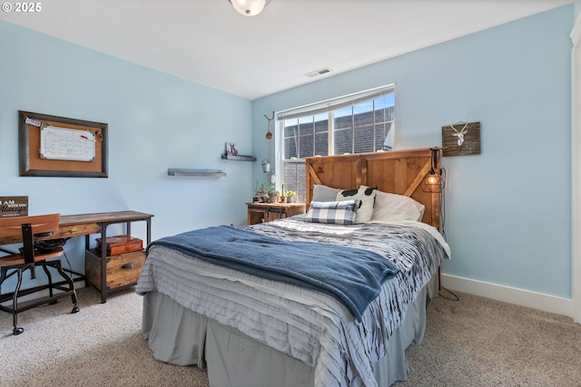 bedroom featuring carpet floors, baseboards, and visible vents
