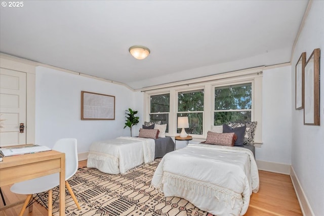 bedroom with light wood-type flooring