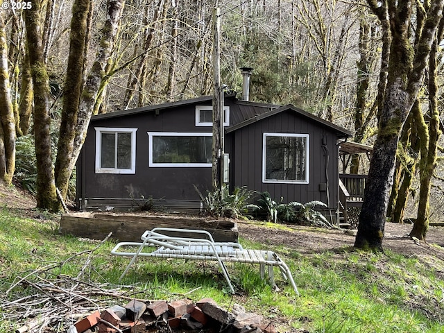 view of front facade with board and batten siding