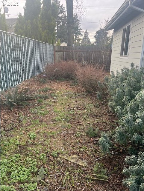 view of yard with fence