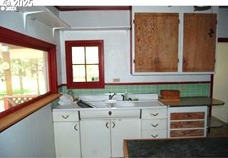kitchen with white cabinetry