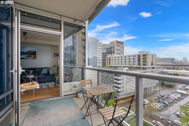 balcony featuring a view of city
