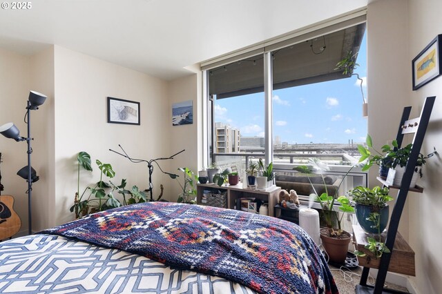 bedroom featuring a view of city
