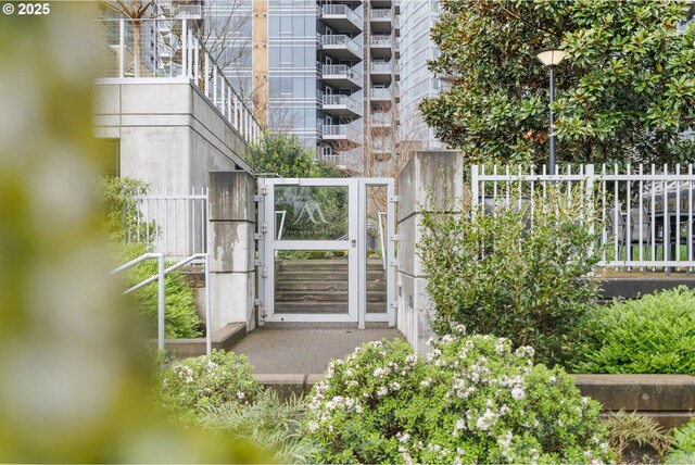 view of gate featuring fence