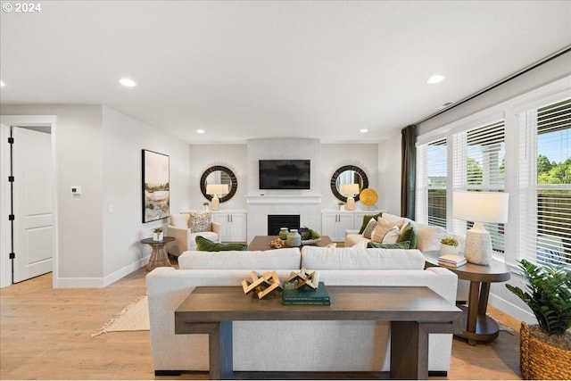 living room with light hardwood / wood-style flooring