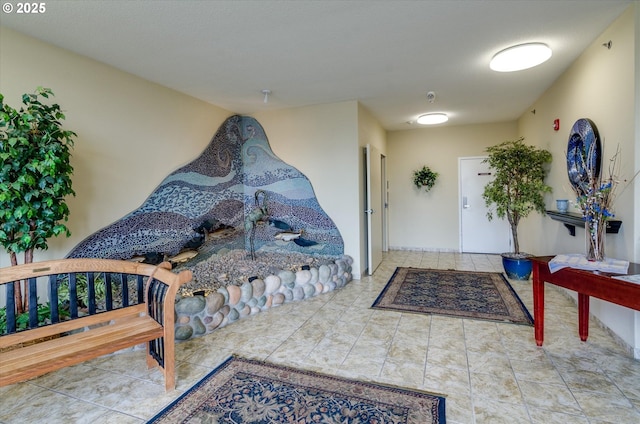 foyer with tile patterned flooring