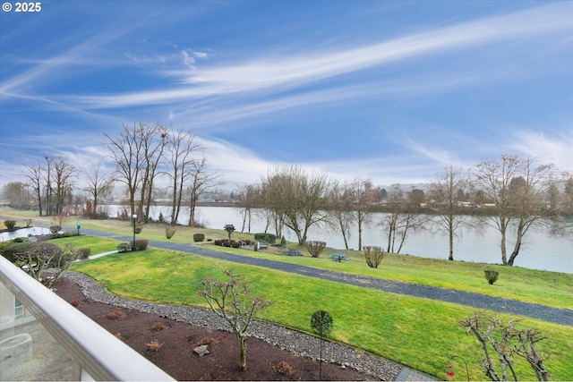 view of yard with a water view