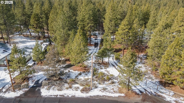 bird's eye view featuring a view of trees