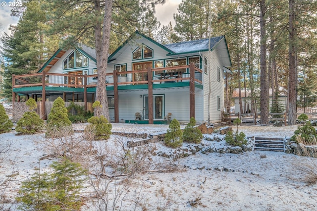 view of front of property featuring a wooden deck