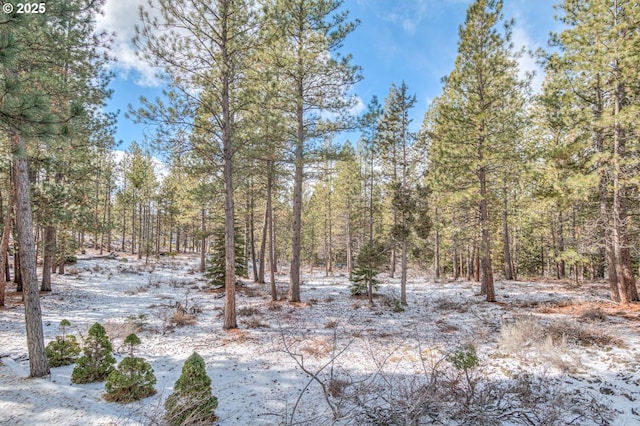 view of landscape with a view of trees