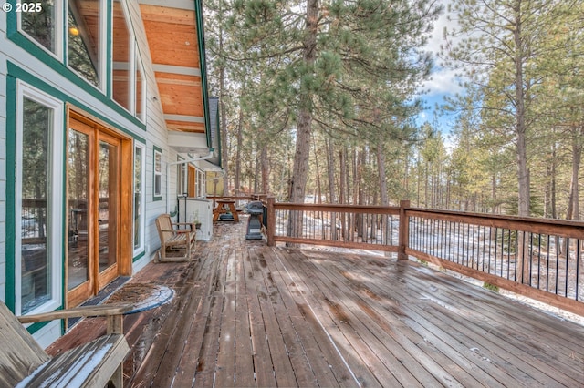 wooden deck with area for grilling