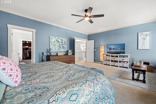 6244 SE Jess Ct, Hillsboro, OR 97123 - bedroom with carpet floors, ornamental molding, a closet, a spacious closet, and a ceiling fan