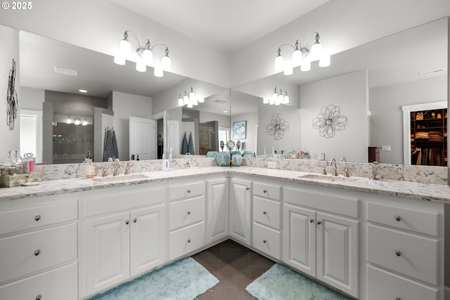 6244 SE Jess Ct, Hillsboro, OR 97123 - full bath with a sink, tile patterned flooring, a tile shower, and double vanity