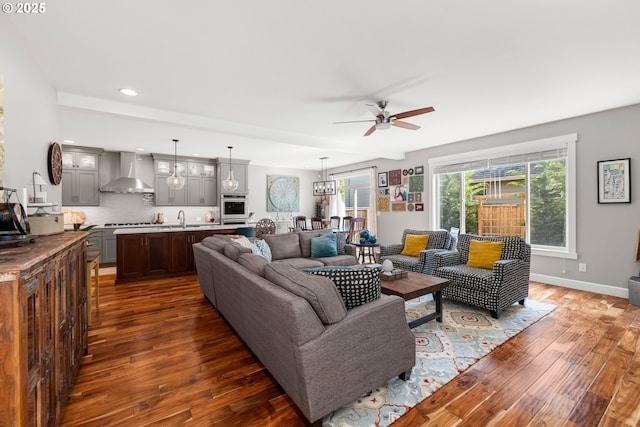 6244 SE Jess Ct, Hillsboro, OR 97123 - living room featuring recessed lighting, baseboards, a ceiling fan, and dark wood-style flooring