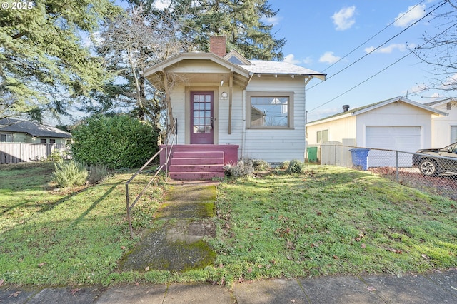 bungalow-style house featuring a front yard