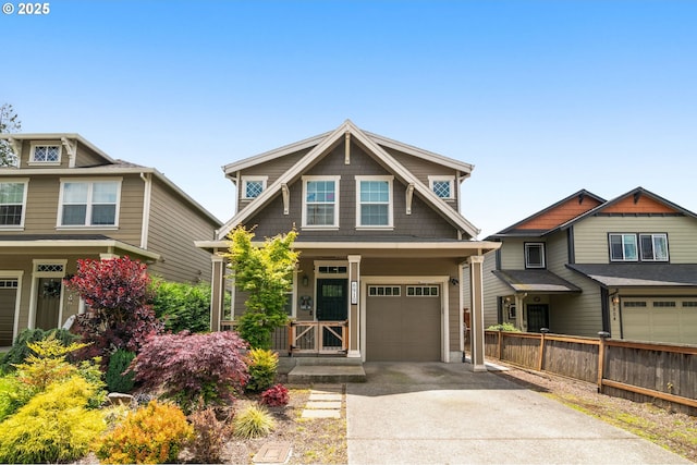 6910 SE Lamphier St, Milwaukie, OR 97222 - craftsman-style home featuring an attached garage, concrete driveway, and a porch